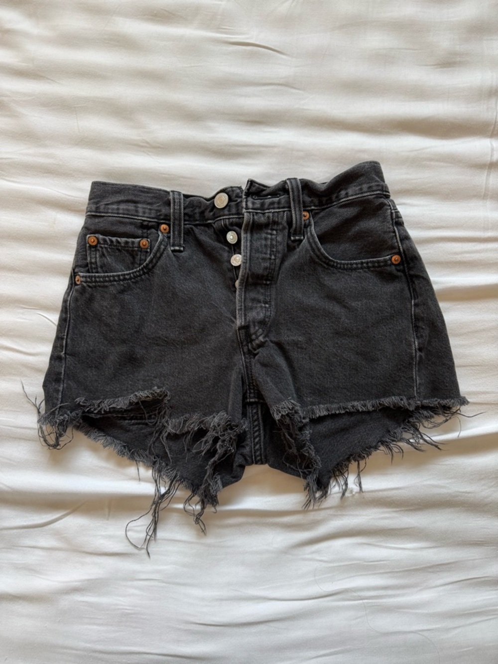 Levi’s 501 High-Rise Distressed Black Denim Shorts